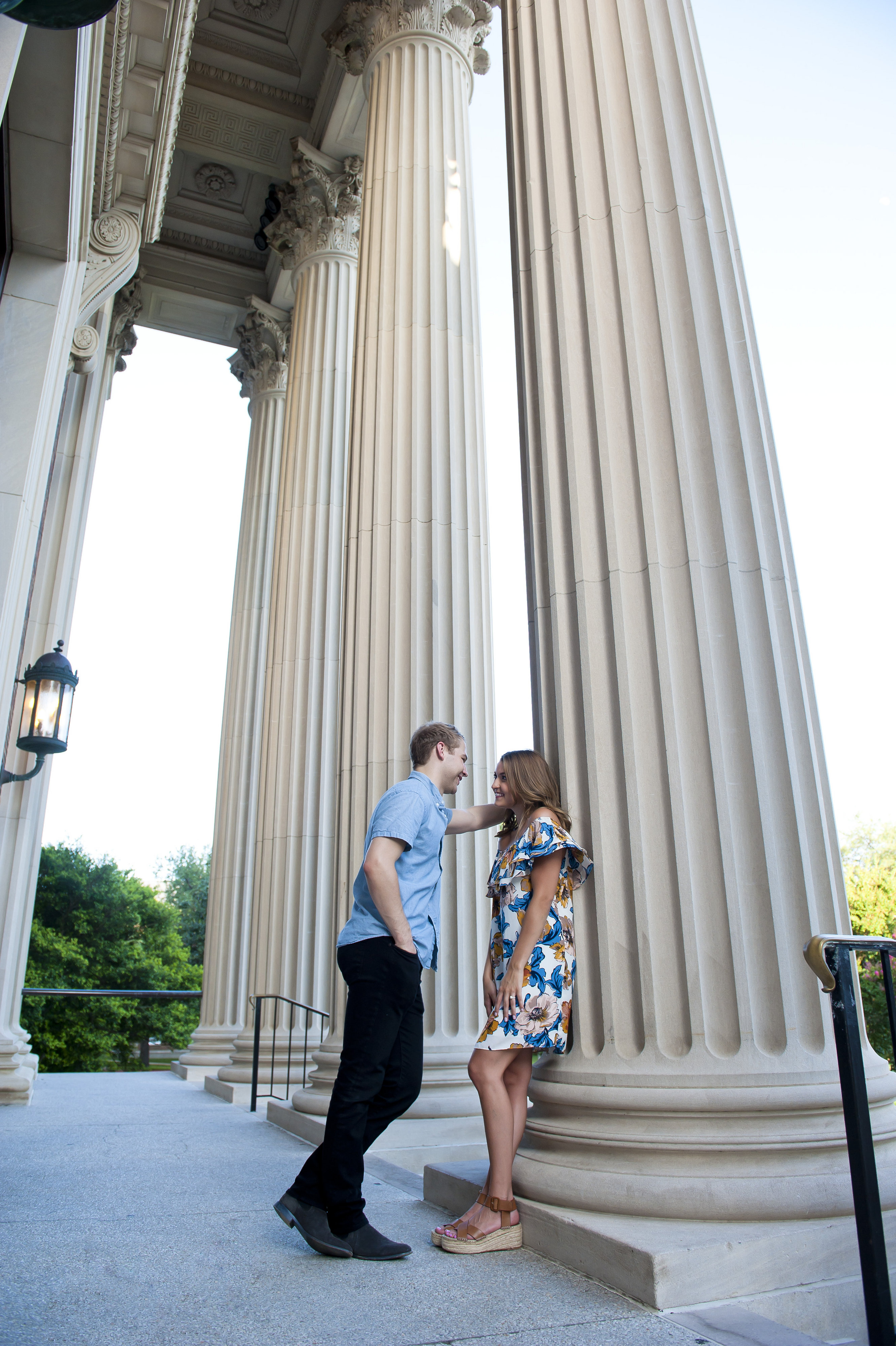 Couple Leaning on SMU Architectural Column