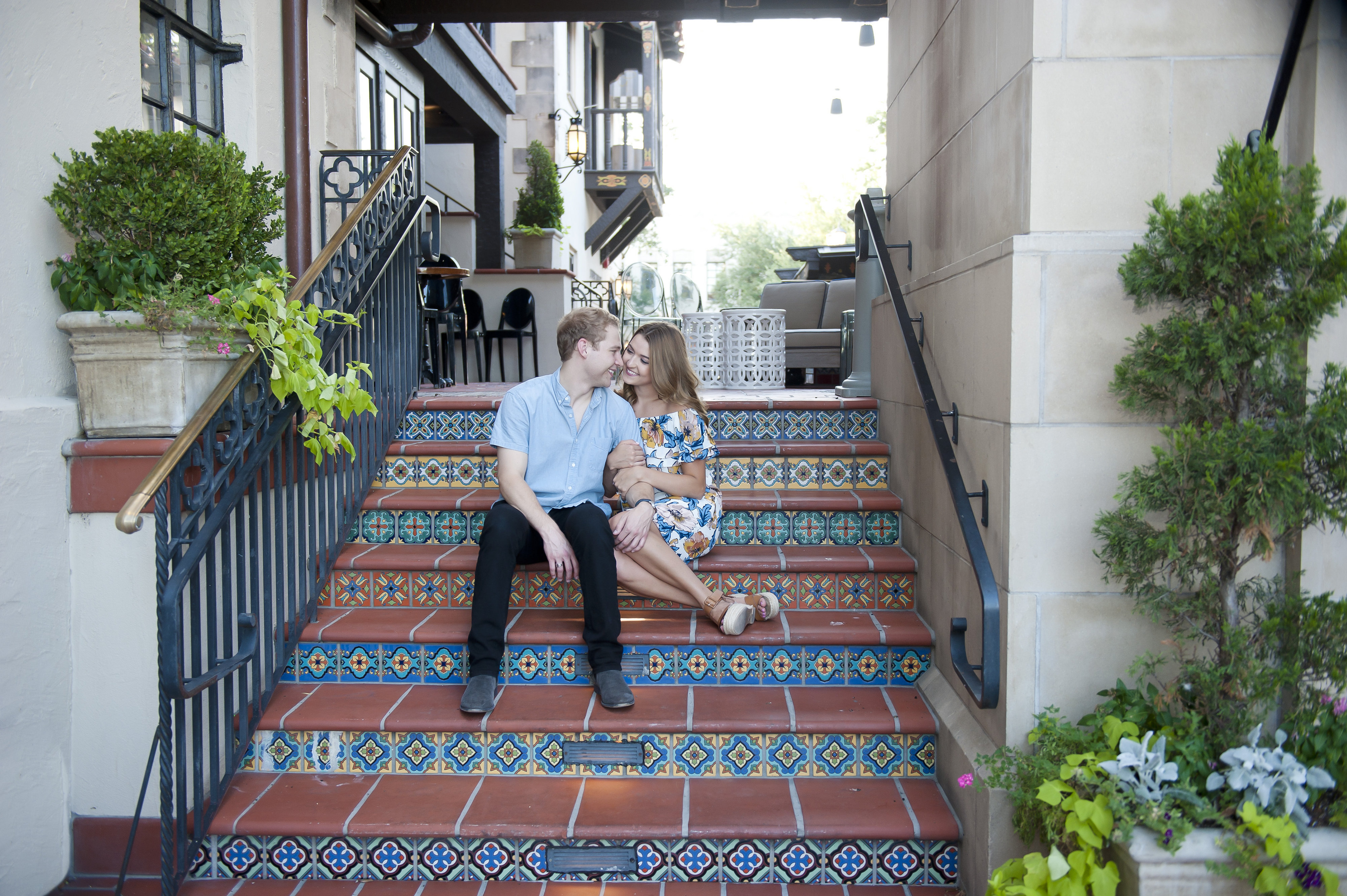 Couple Sitting and Embracing on Colorful Steps