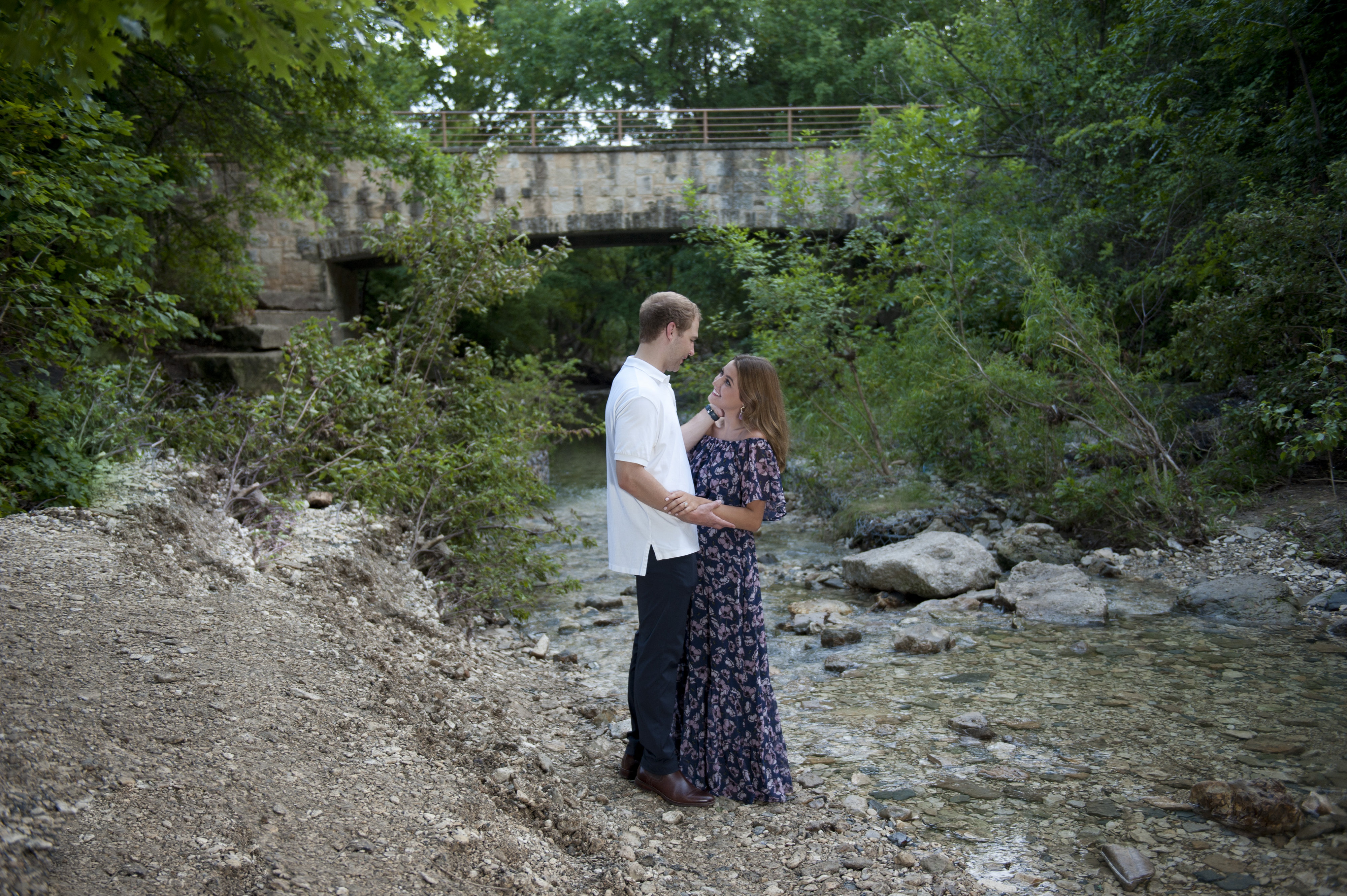 Couple Embracing Near Creek